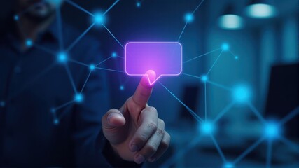 A person interacts with a glowing digital speech bubble on a futuristic network interface, symbolizing communication and technology.