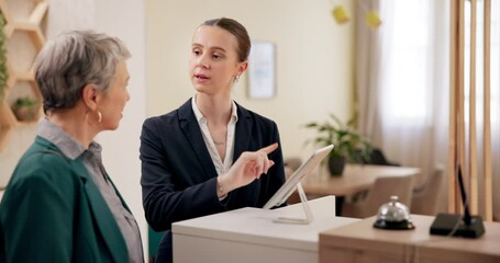 Woman, tablet and client at hotel reception for booking, room availability and discussion for options. Receptionist, tech and customer in lobby for resort activity schedule, payment plan and service