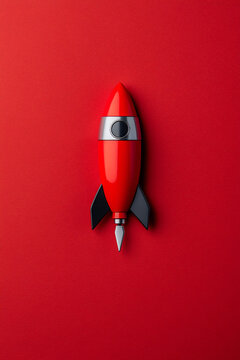 red rocket pen on red background