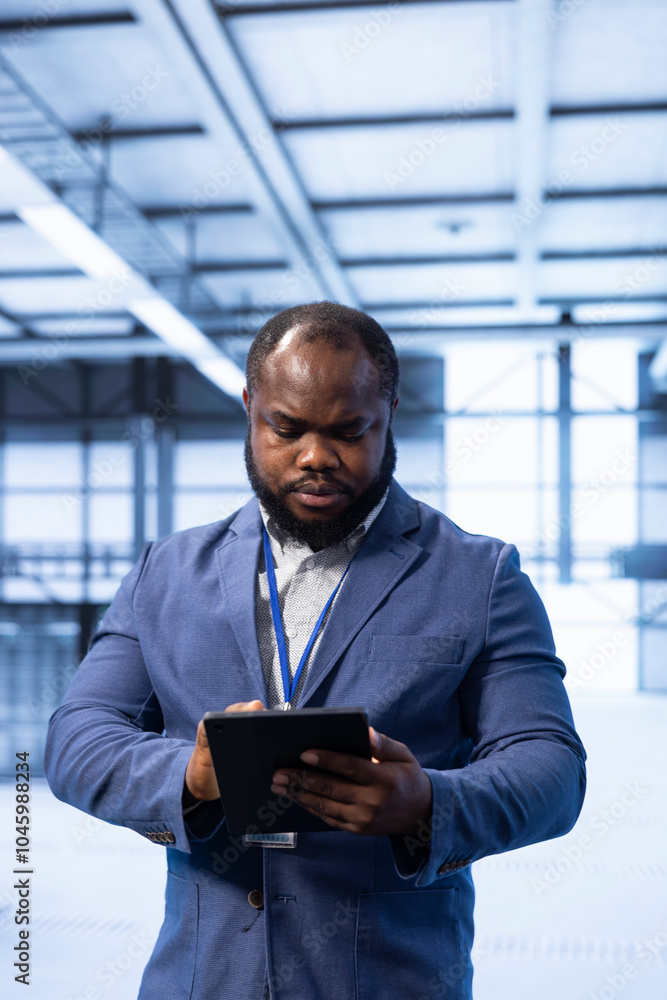 Poster data center technician ensuring safety and security of database using tablet. server hub employee pr