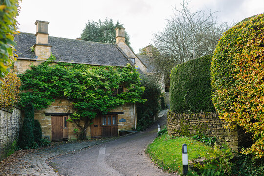 Autumnal English Village with Limestone Cottages and Autumn Trees - Quintessential Filming Location for Father Brown in Blockley, Gloucestershire in The Cotswolds