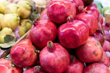 fresh vegetarian background juicy healthy market food pomegranate fruit red ripe organic closeup