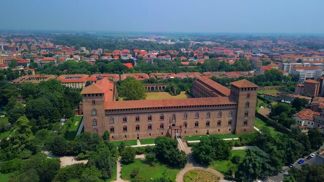 Drone view of the city with the cathedral and the castle of the Visconti dynasty and the museum, archaeological finds. City of a hundred towers historical medieval architecture. Italy Pavia 22.04.2025