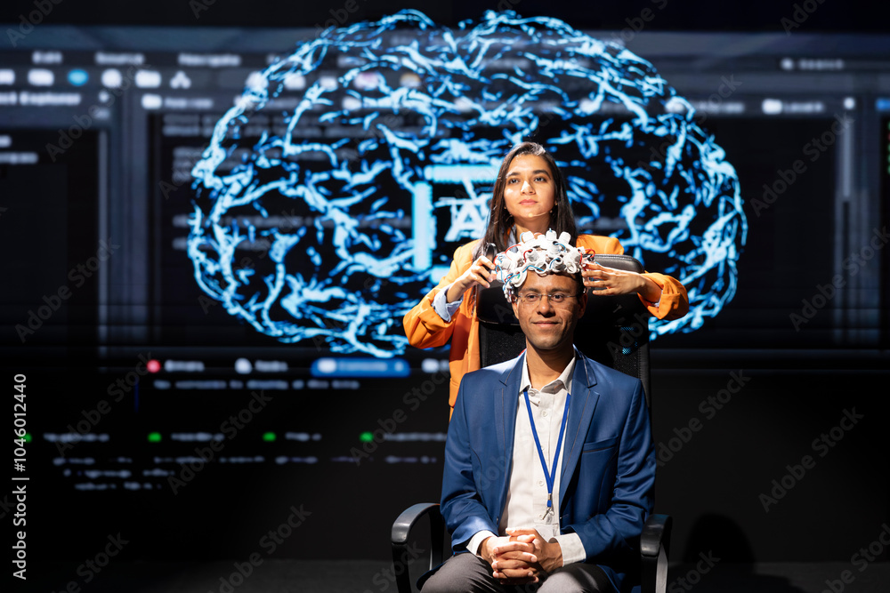 Poster experts speaking at tech event, explaining impact of neural implants and artificial intelligence tec