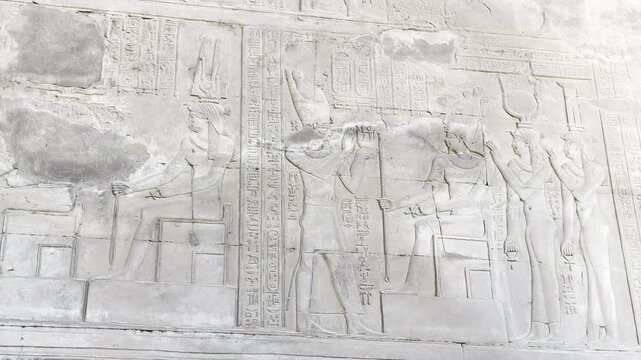 The hieroglyphs covering the walls of the temple of Kom Ombo, dedicated to the crocodile god Sobek. These intricate carvings provide valuable insights into Egyptian mythology.