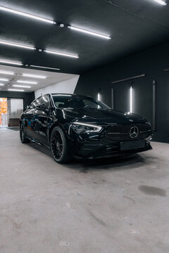 Photo of a Mercedes CLA 2024 in detailing studio. They show details of the car from the outside and inside. The photo is suitable for use in marketing materials, advertisements or press articles.