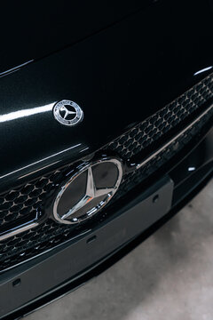 Photo of a Mercedes CLA 2024 in detailing studio. They show details of the car from the outside and inside. The photo is suitable for use in marketing materials, advertisements or press articles.