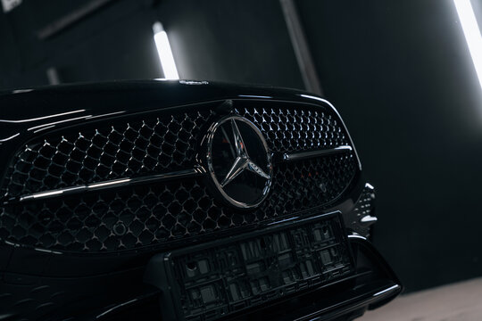 Photo of a Mercedes CLA 2024 in detailing studio. They show details of the car from the outside and inside. The photo is suitable for use in marketing materials, advertisements or press articles.