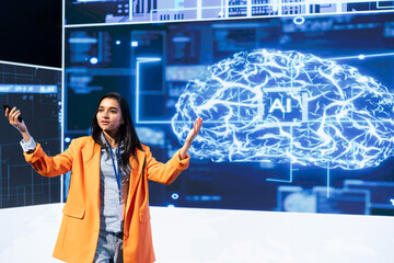 Woman speaking at tech summit, exploring latest AI technology trends and case studies. IT...