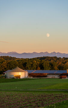 Serene moonset over Estavayer le Lac in Switzerland