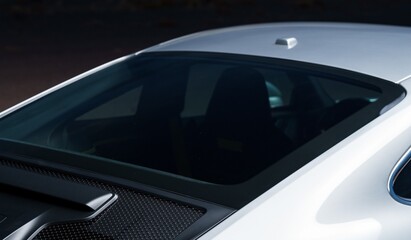 Rear window on a silver car