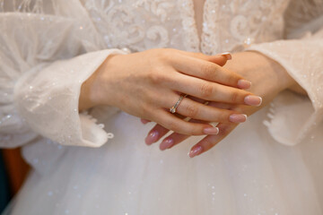Elegant Bridal Hands with a Sparkling Ring