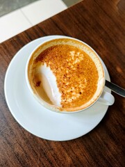 Half cup of creme brulee drink