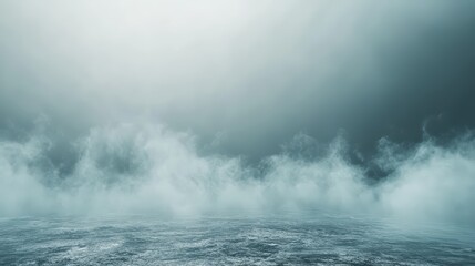 Naklejka premium Misty landscape with soft clouds and gentle waves, evoking a serene and tranquil atmosphere.