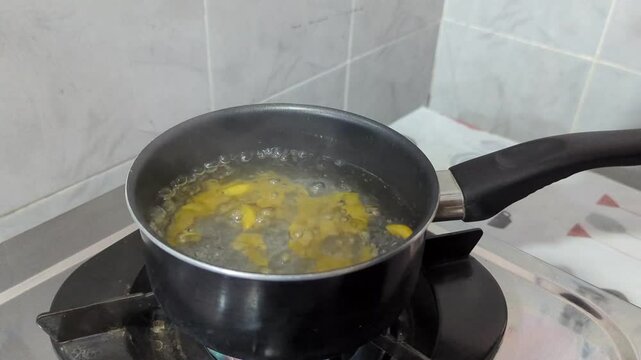 Close-up of boiling macaroni in a pot. Cooking preparation, pasta cooking, recipe tutorial, culinary video, kitchen technique, 4K video