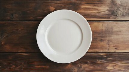 white ceramic plate isolated on a wooden table