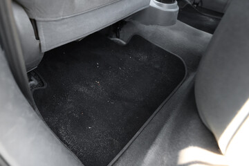Black soft car floor mat in auto