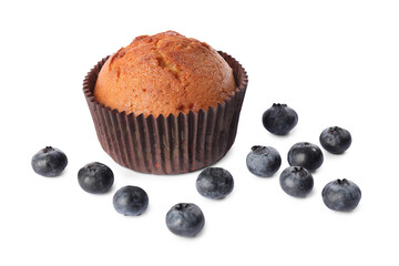 Delicious sweet muffin and blueberries isolated on white