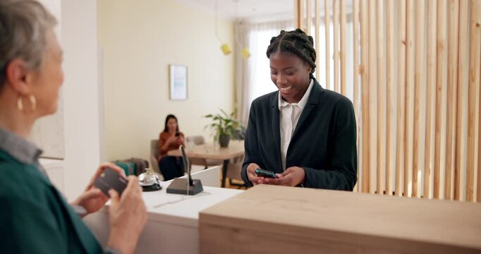 Woman, guest and payment at hotel reception for booking, room availability or friendly service. Receptionist, customer or credit card in spa lobby for transaction, hospitality or business support