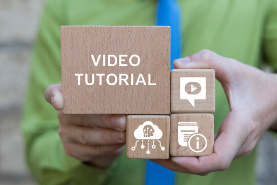 User holding wooden blocks sees inscription: ONLINE LIBRARY. E-learning education concept. Online learning with webinar, video tutorial, internet lessons.
