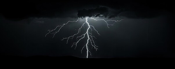 Lightning striking during a storm against a dark sky.