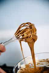 Cake making whisk and frosting