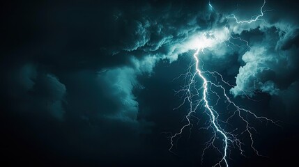 Dramatic lightning strike illuminating dark stormy clouds.