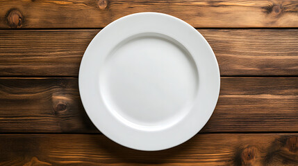 white plate isolated on a wooden table
