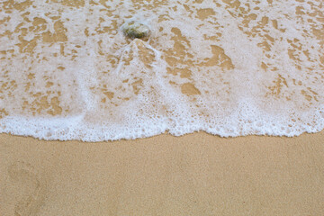 View of the waves washing the beach
