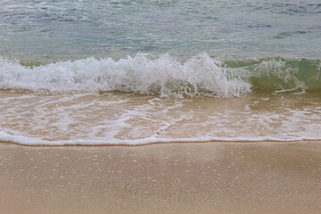 View of the waves washing the beach
