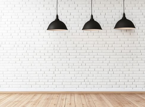 Fototapeta Three black pendant lights hanging in front of a white brick wall with a wooden floor.