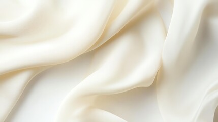 Obraz premium Soft, elegant white fabric draping smoothly on a white background.