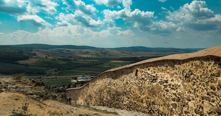 Majestic Castle Wall with Cloudy Sky in Romania