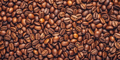 Fototapeta premium A Close-Up View of Roasted Coffee Beans, Showing Their Rich Brown Hues and Detailed Textures