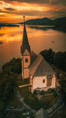 Church of Maria Worth at Woerthersee Lake in Carinthia Austria at Sunrise