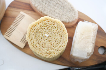 A beautiful arrangement of Natural Bath Essentials elegantly displayed on a Wooden Board