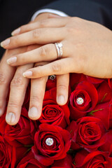 Newly Married Couple with Roses