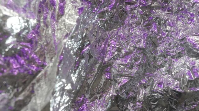 crinkled metallic silver mylar with purple reflections