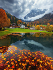 stunning beautiful view  foliage lake house scenery  in countryside rural in Switzerland alps mountain in fall season 