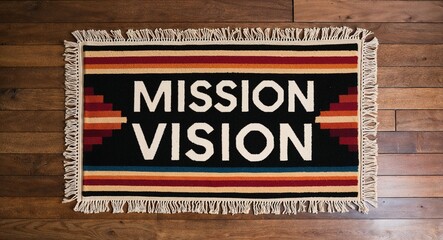 Fototapeta premium mission vision text on mat rug in wooden floor background