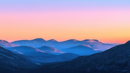 Obraz premium Photography image of a serene sunrise over a mountain range, the peaks glowing pink and orange as the sun rises above the horizon
