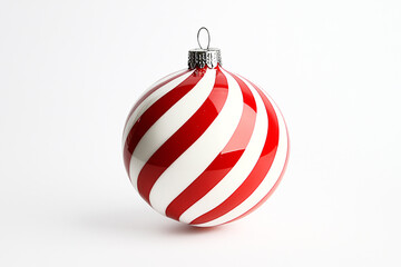 Single red and white striped Christmas bauble ornament on white  background