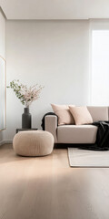 Modern living room with neutral tones, cozy sofa, and stylish decor in a sunlit space