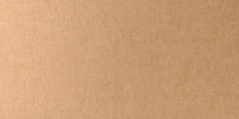 Fototapeta premium Recycle paper background. Macro shot. Abstract brown recycled cardboard paper texture background