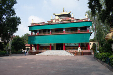 "karma temple" with adjucent relic 'stupa', a beautiful buddhist monastery showcases the life and teachings of lord buddha, bodh gaya, india