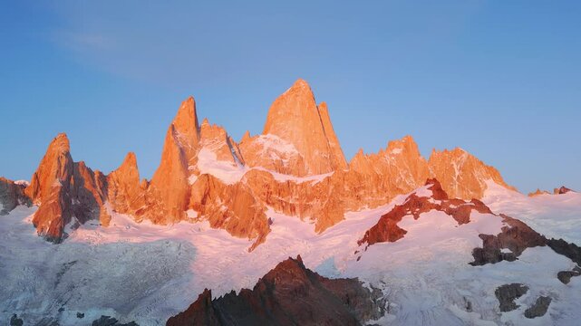 Aerial drone footage at sunrise of the Fitz Roy mountain in El Chalten, Patagonia, Argentina.