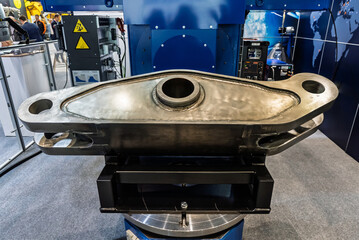 Multi axis robot welding steel. Industrial welding robot and working with metal parts. Robot welds steel. Welding head. Welding robot. CNC welding. Robotization and automation of the welding process.