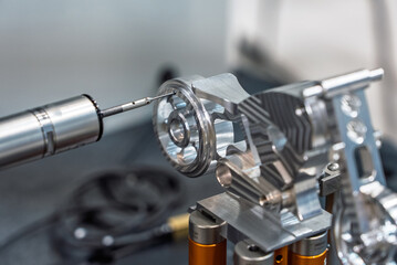 3D coordinate measuring machine. 3d precision measurement on machine quality control parts. Measuring machine for finished parts after cnc machining. Measuring machine.