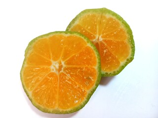 Lemon isolated.2 Round slice of ripe lemon on a white background. Fresh fruits with copy space.