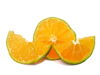 half lemon and slice isolated on white background. orange peel is green.